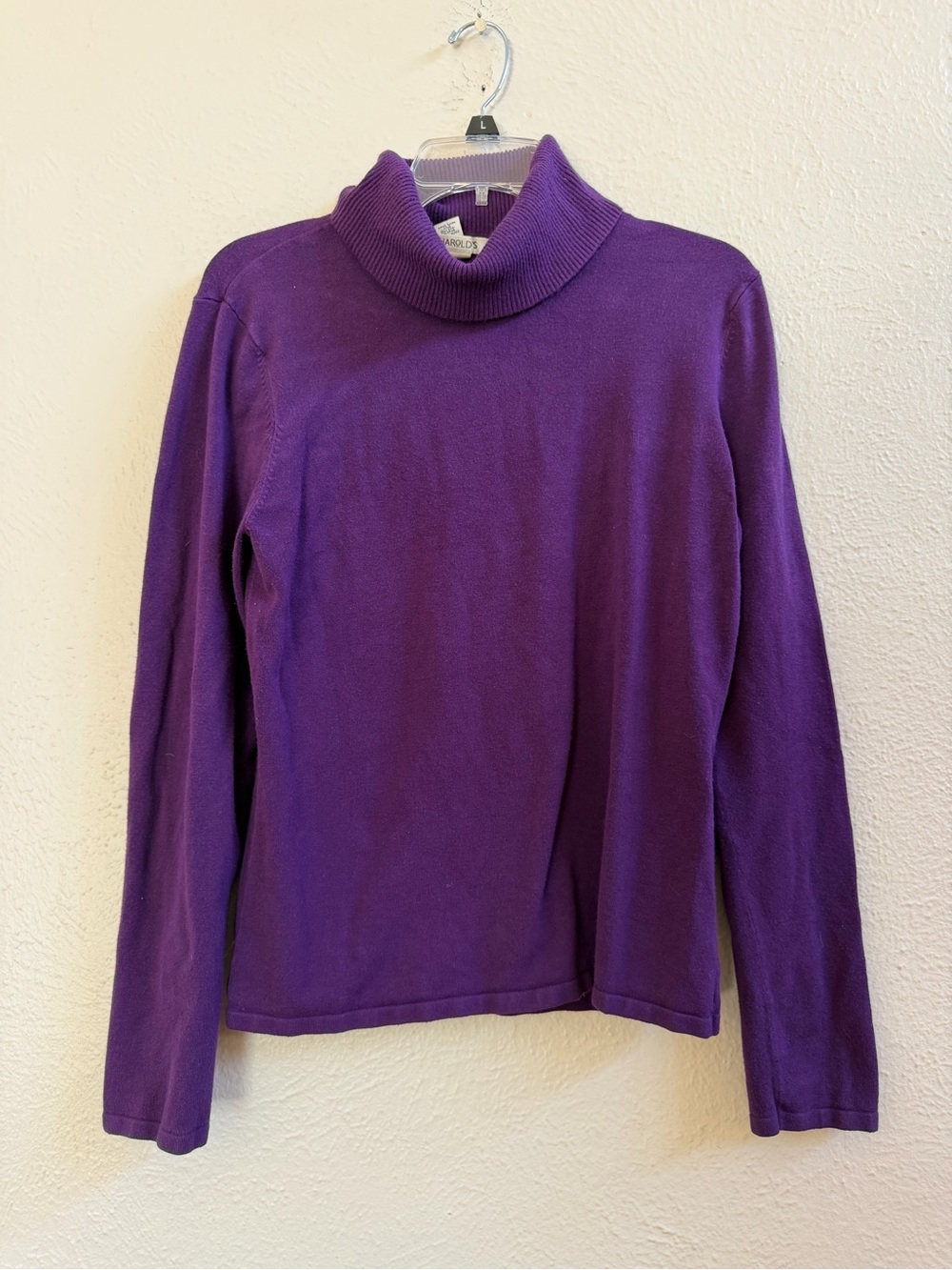 Harold’s purple turtleneck sweater